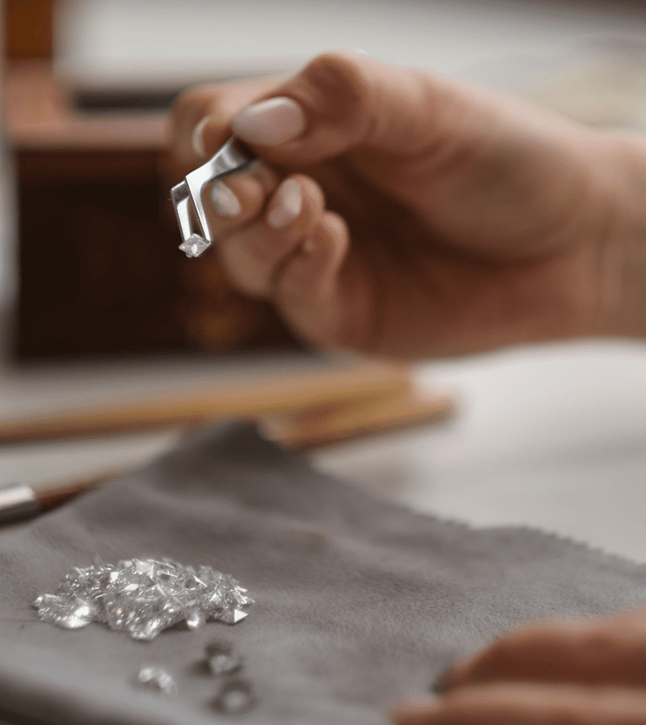 Hand holding a diamond